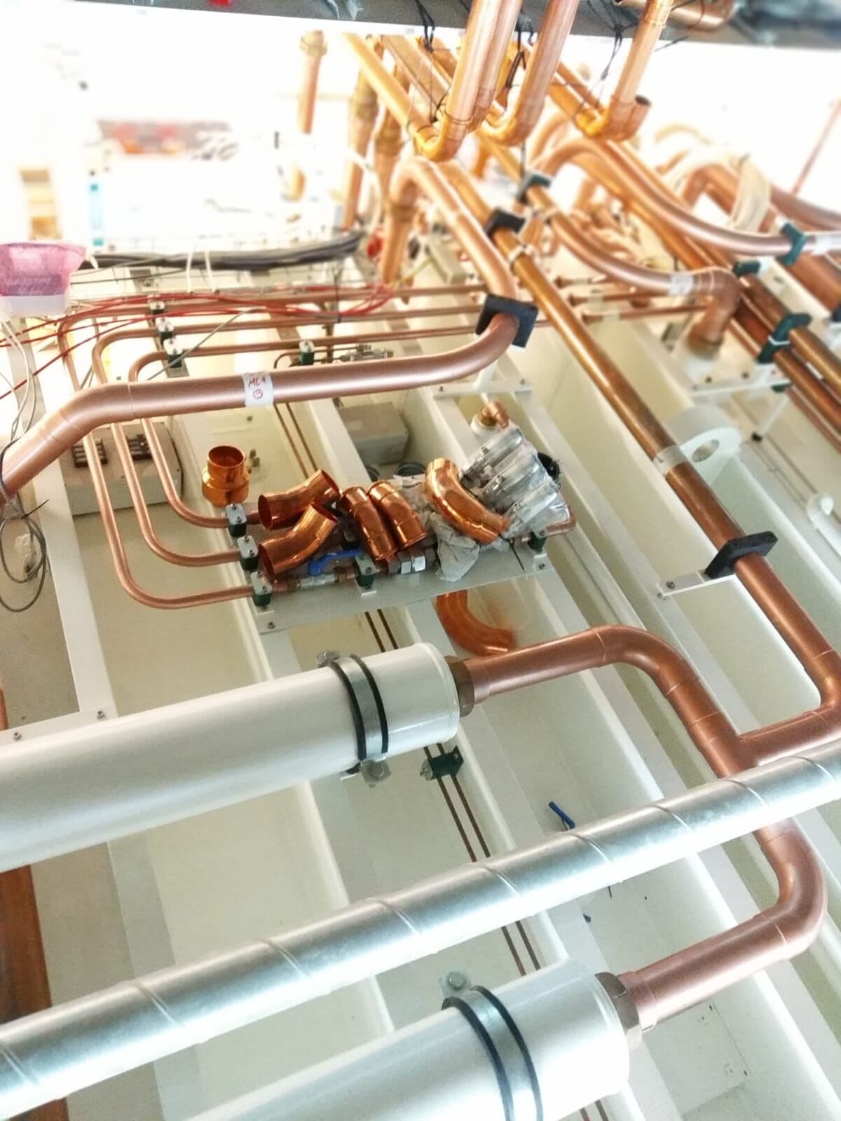 Copper medical gas pipework above the hyperbaric chamber at Hamad Medical Corporation