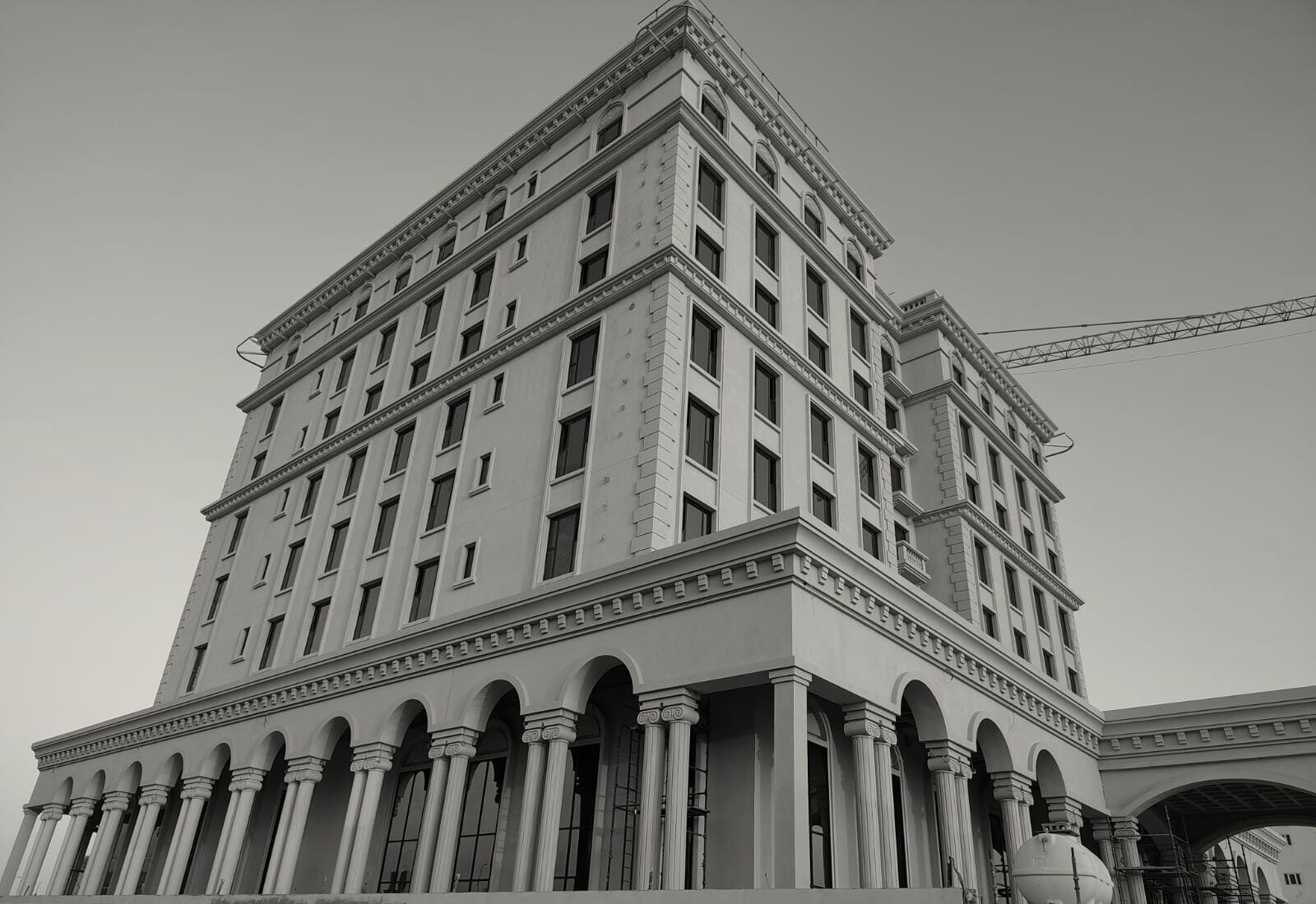 The Hilton Garden Inn, Al Hofuf, its colonnade and upper floors seen from the street