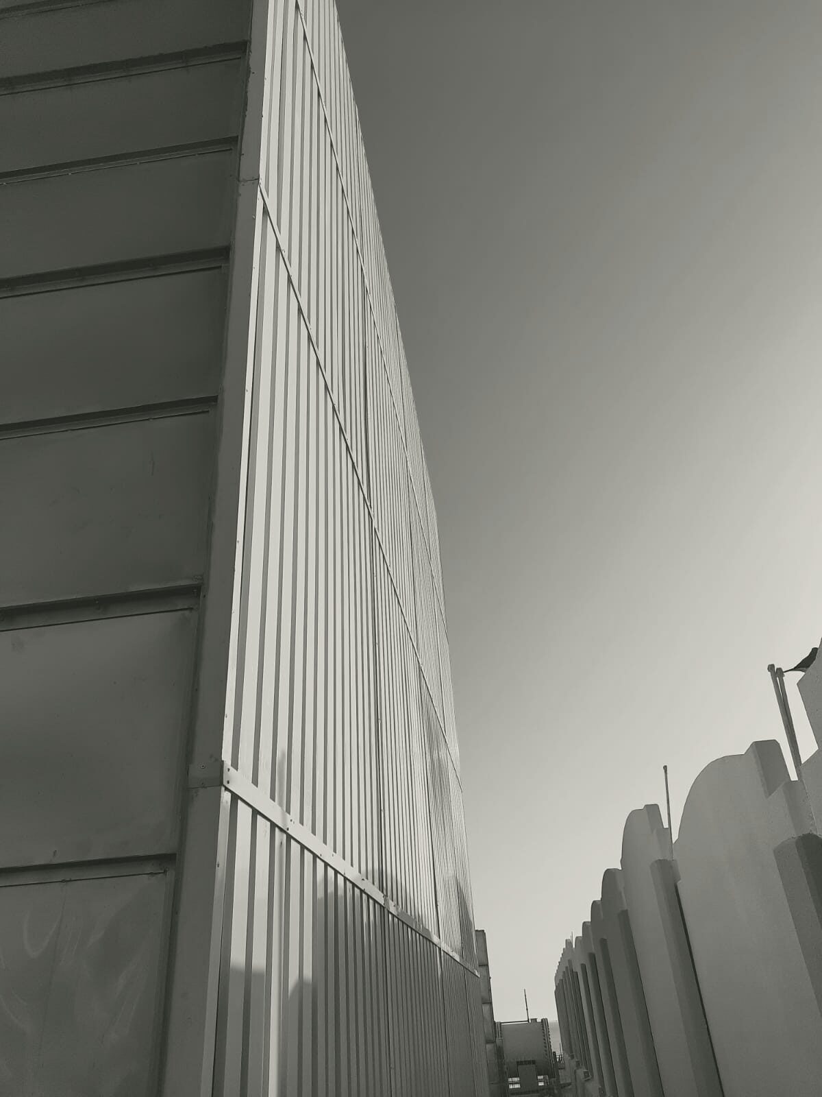 A stainless steel wet-well plenum rising against the sky