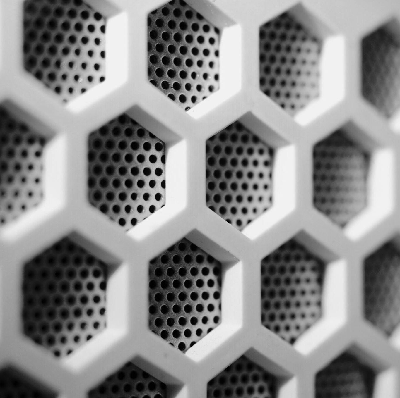 The honeycomb face of a polycarbonate grille