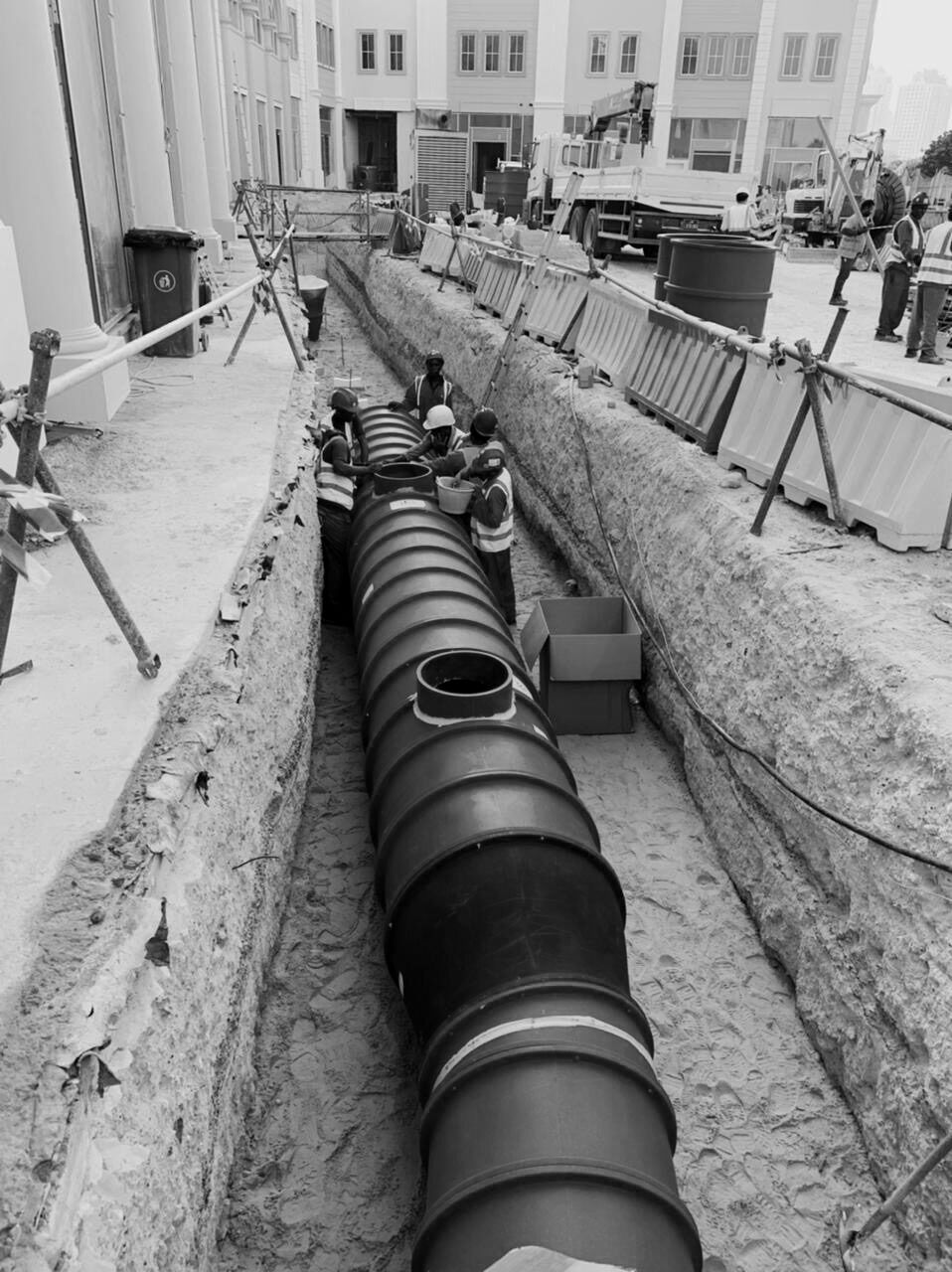 R-10 HDPE duct laid in the trench before the paving